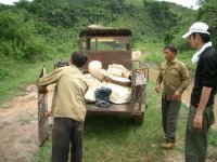 Carrying Rubber Latex to a Village by Small Truck, Luang Namtha District, Luang Namtha Province (Jun. 2008, Mr. Shinichi Kawae)